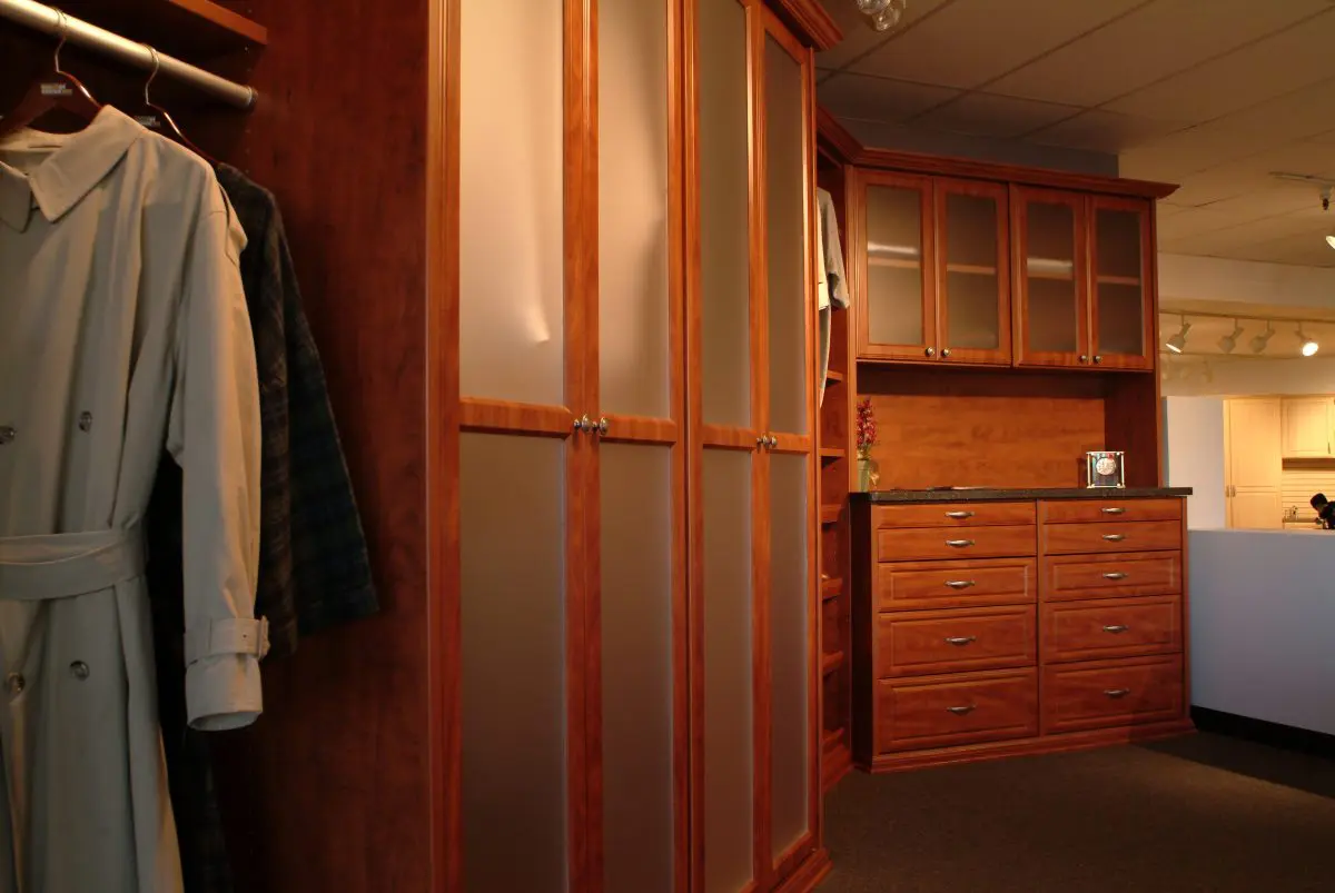 cabinets and closets with dark brown finish