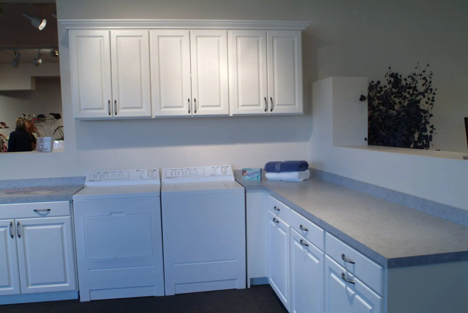 laundry counters and cabinets with white finish